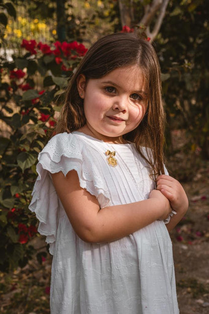 Segurito Virgin of Guadalupe frame of pearls in bow tie