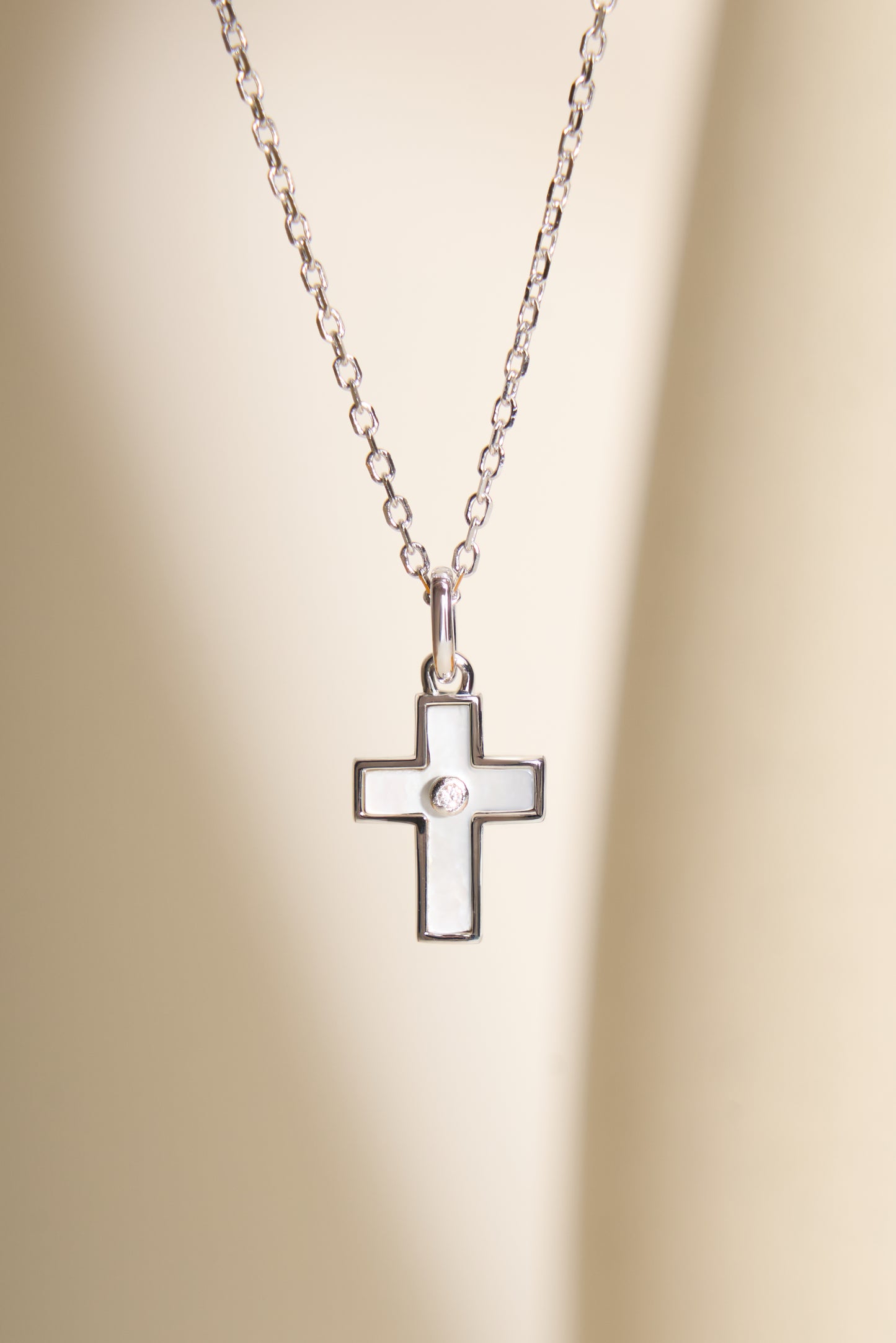 Mother of pearl cross with zirconia