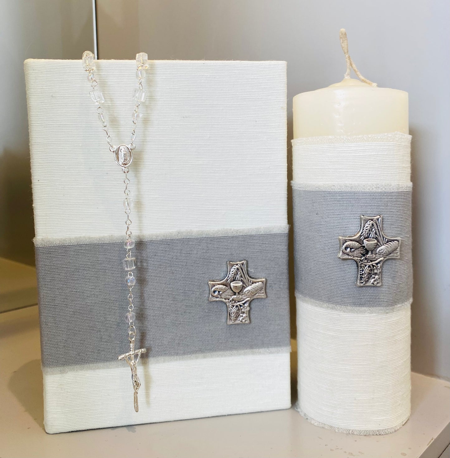 Bible and candle for First Communion