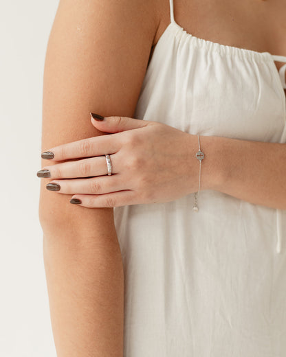 Silver bracelet with cross charm