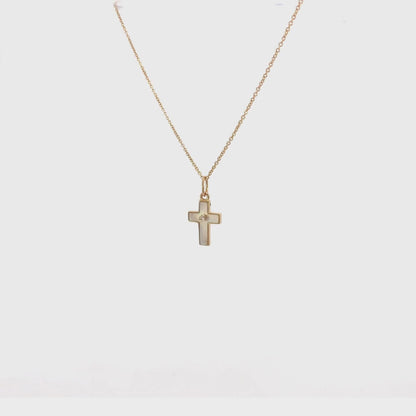 Small 14K gold cross with mother of pearl and zirconia in the center
